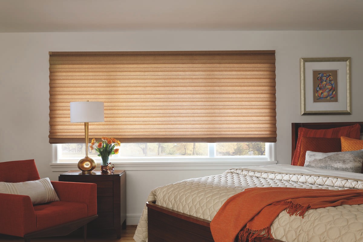Bedroom window treatments for homes near Fairport, New York (NY) including custom Hunter Douglas Roman Shades.